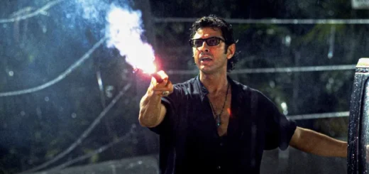 Ian Malcolm segurando um flare em Jurassic Park