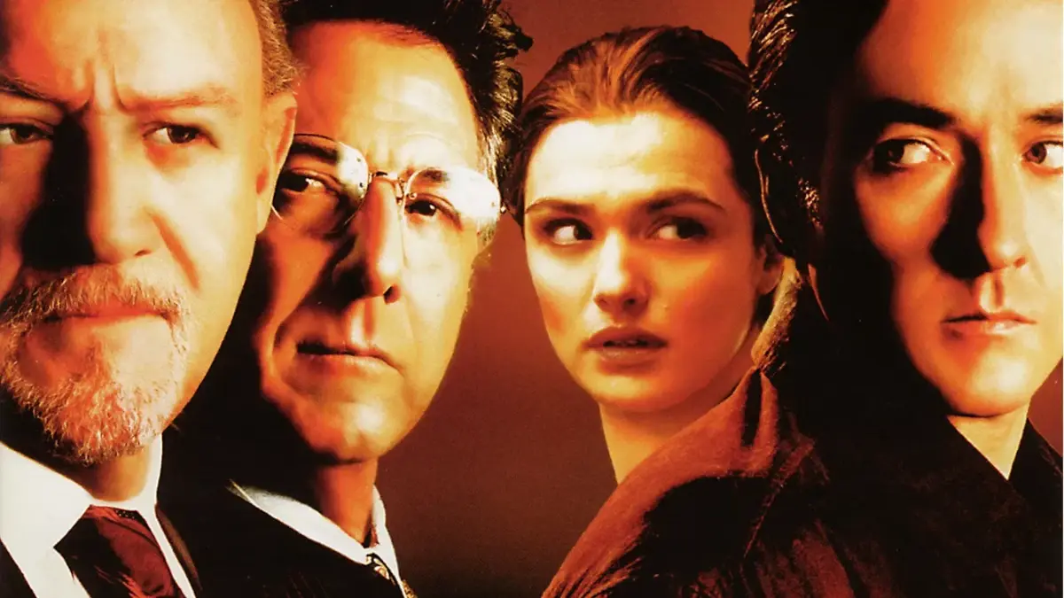 O Júri de Gary Fleder e John Grisham: Entre o Veredito e o Simbólico — Quando a Justiça Vira Espetáculo de Manipulação 1 Elenco principal do filme O Júri (2003) em imagem promocional com foco dramático