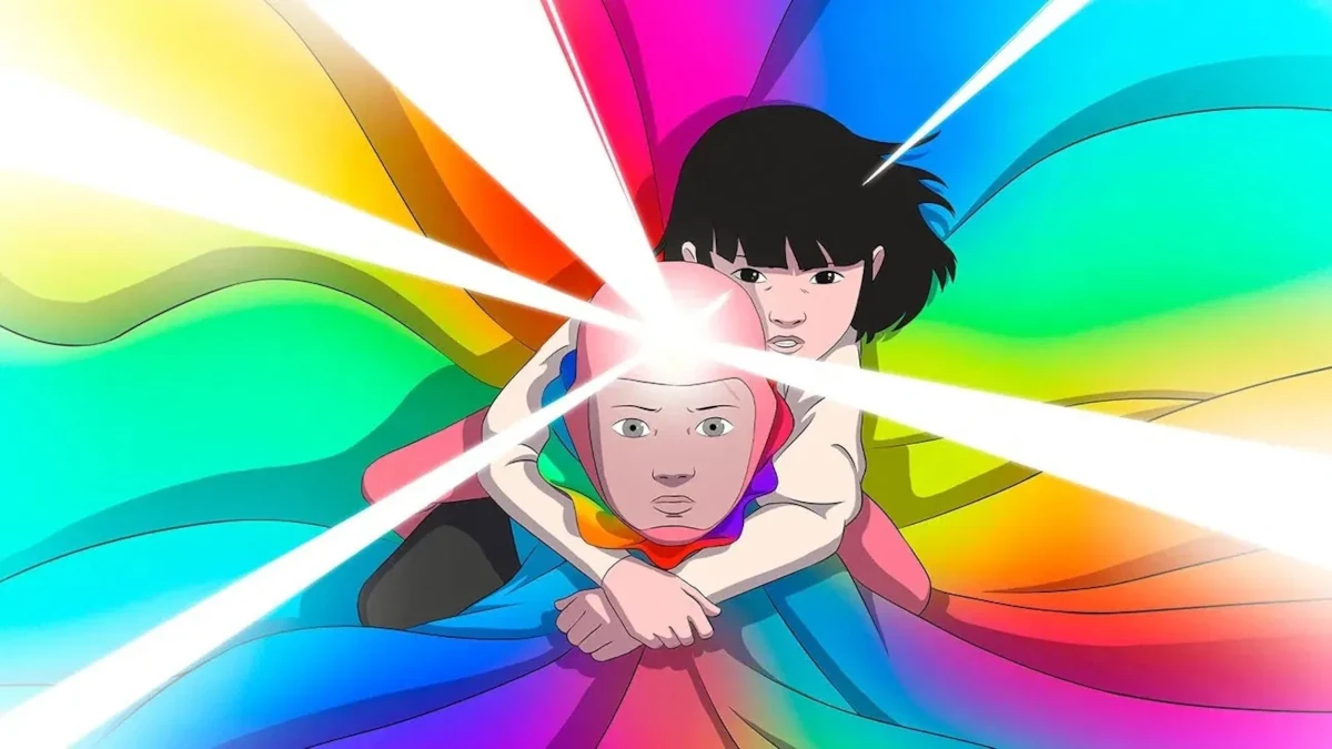 Arco (2025): O Salto que Coloriu a Animação Independente 1 Cena do filme Arco (2025) com Arco e Íris envoltos por um feixe de luz multicolorido simbolizando viagem no tempo.