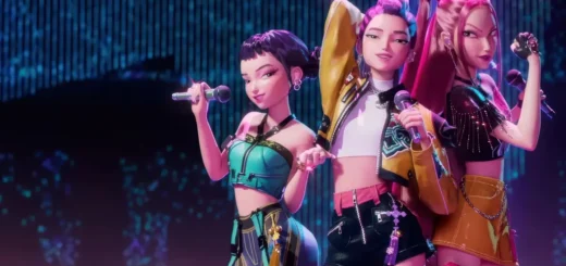 Grupo fictício HUNTRX performando no filme KPop Demon Hunters com estética inspirada no K-pop e luzes neon