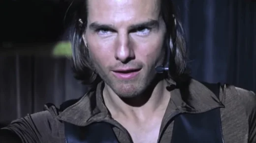 Tom Cruise como Frank T.J. Mackey em Magnólia (1999) durante palestra sobre masculinidade