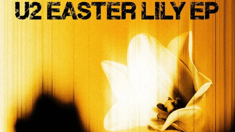 Lírio branco em fundo dourado representando o EP Easter Lily do U2 lançado na Sexta-Feira Santa de 2026