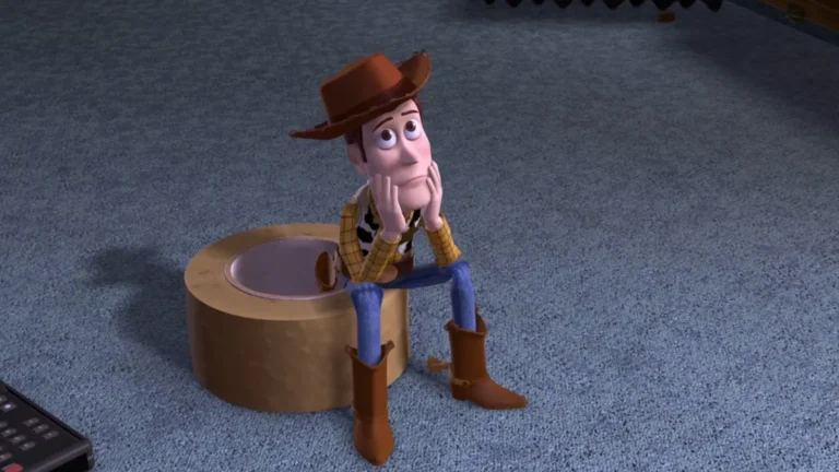 Toy Story 2: a sequência que encarou o abandono de frente 1 Woody pensativo em Toy Story 2 refletindo sobre seu futuro e o crescimento de Andy.